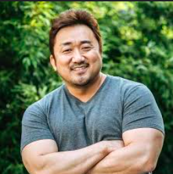 This contains an image of Ma Dong Seok