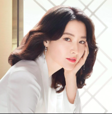 This contains an image of Lee Young Ae