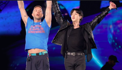 This contains an image of Coldplay and Jin